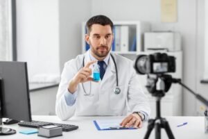 Our Blogs 5 doctor-with-hand-sanitizer-recording-video